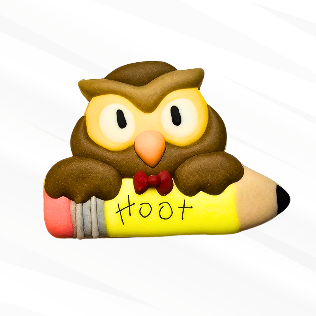 Owl holding a pencil sugar cookie