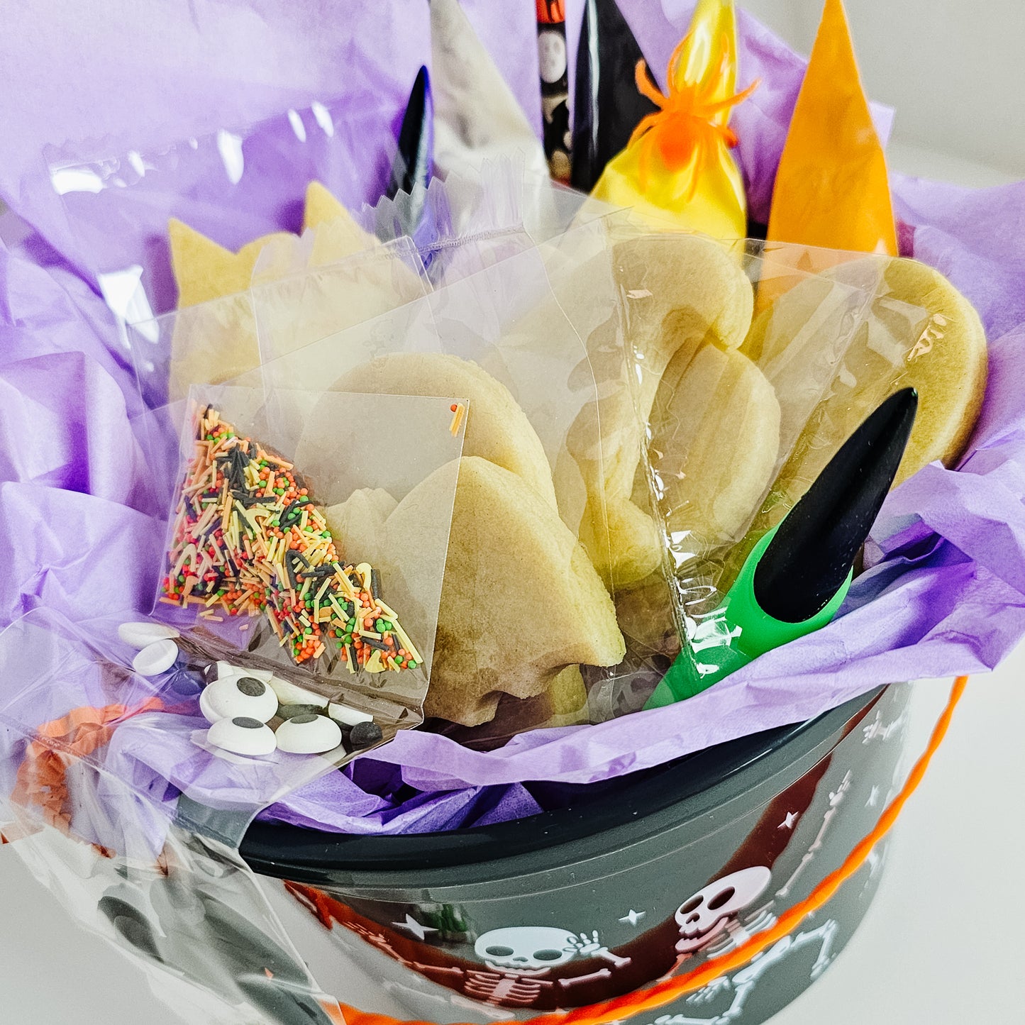 Halloween sugar cookie decorating DIY kit in a festive trick or treat bucket