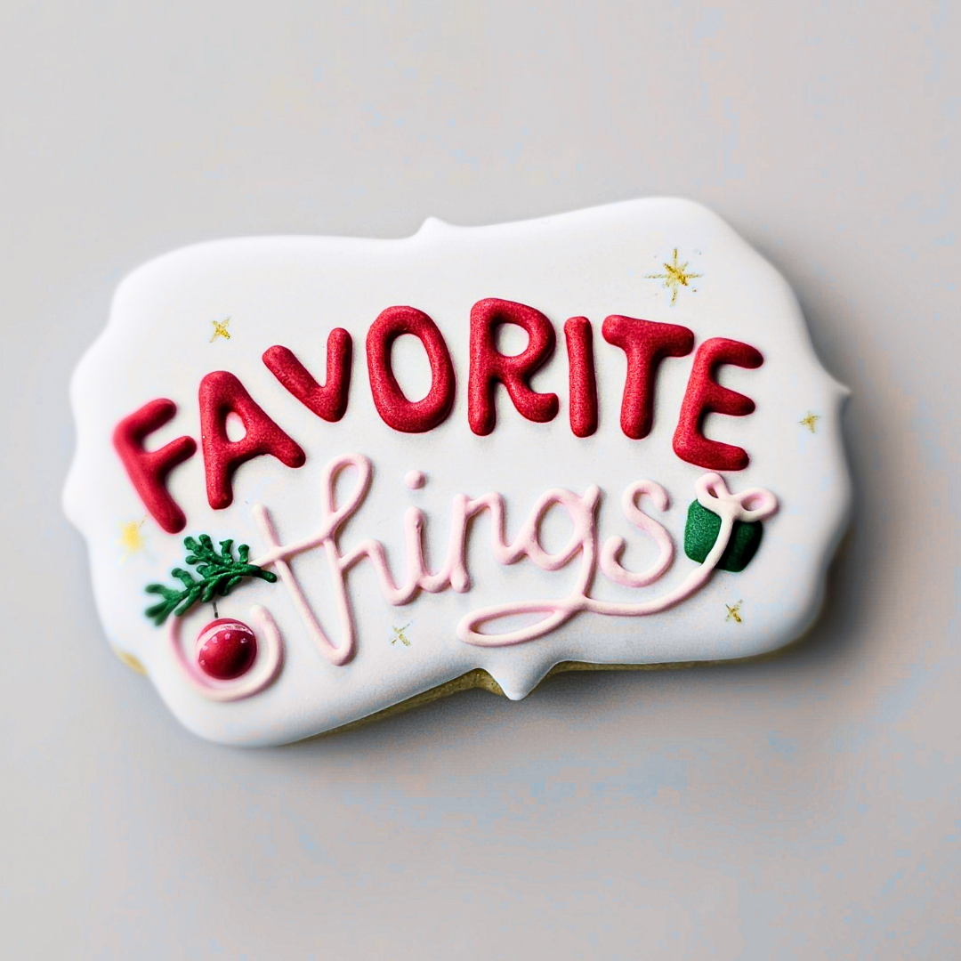 Decorative sugar cookie plaque with 'FAVORITE things' text 