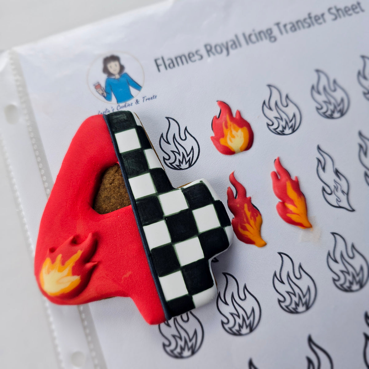 A flames royal icing transfer sheet featuring the number 4 decorated with flames on one side and a black-and-white checkered pattern on the other, shown next to the printed transfer template sheet.