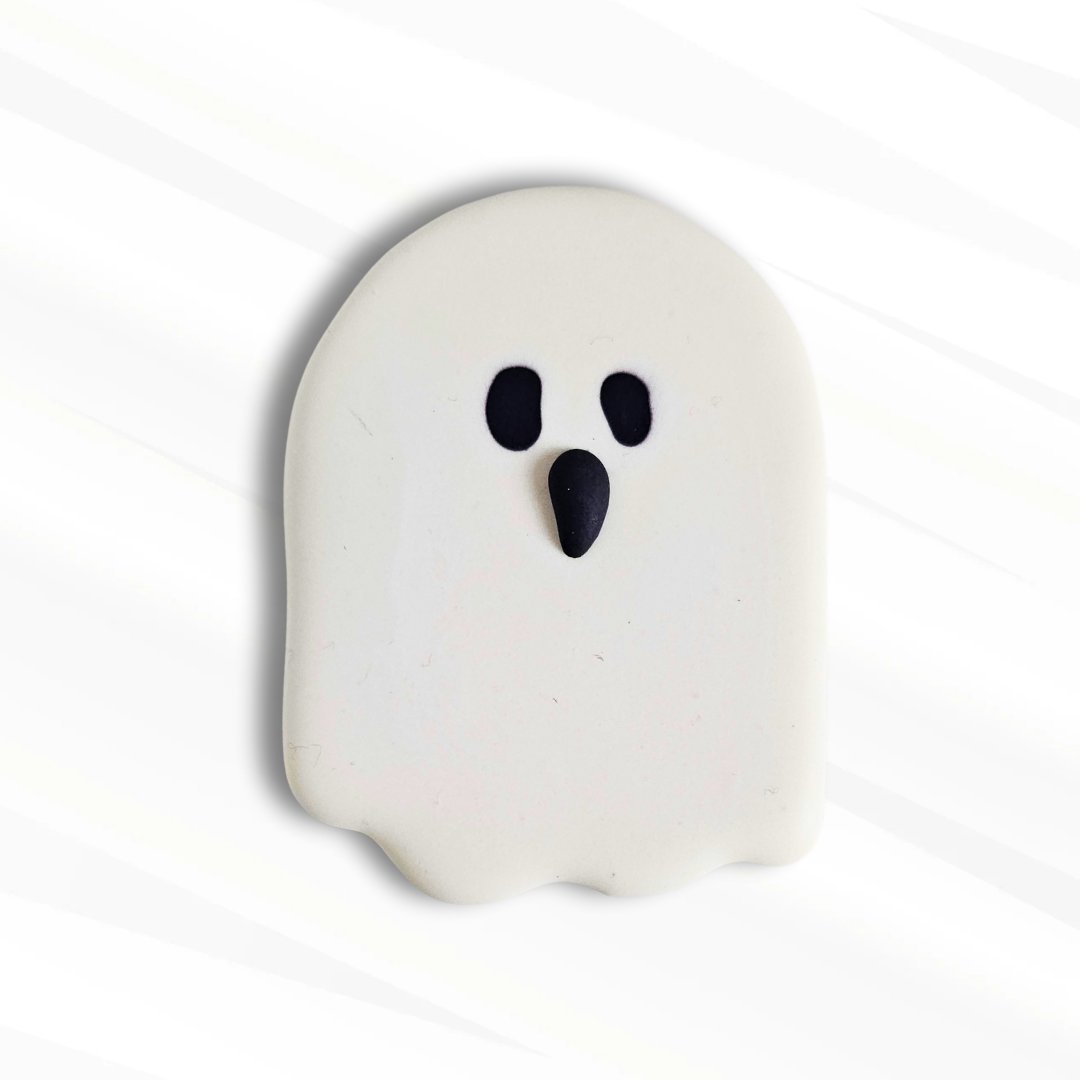 Decorated ghost sugar cookie with ghost eyes royal icing transfers 