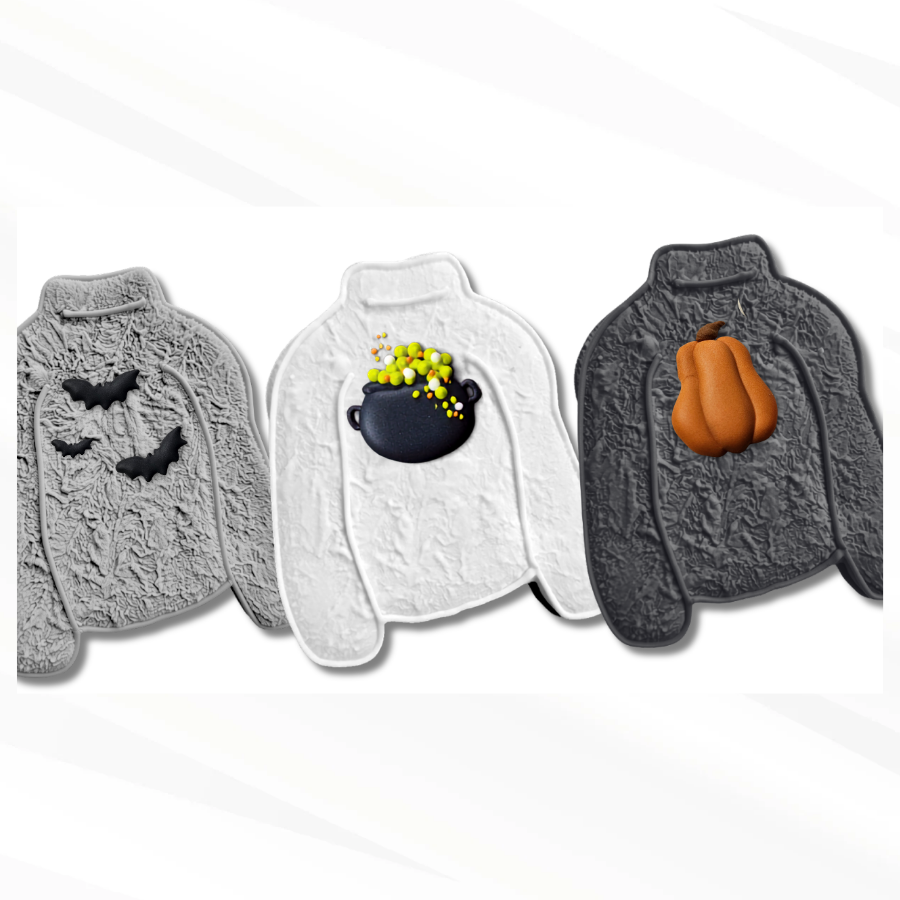 Three Halloween-themed sweater sugar cookie designs shown side by side on a light gray background: a gray sweater with bats, a white sweater with a cauldron of bubbling potion, and a dark gray sweater with a pumpkin.