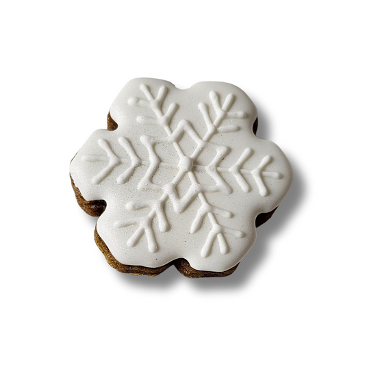 Snowflake sugar cookie on a white background