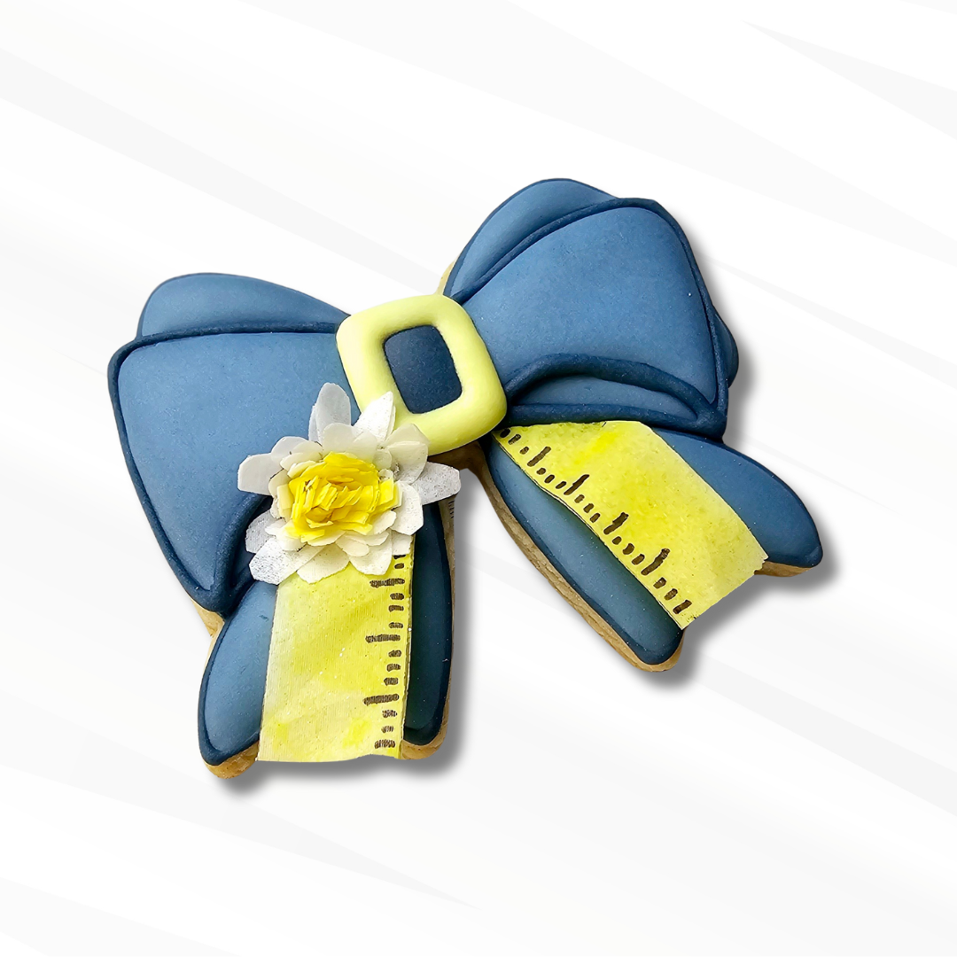 Blue bow sugar cookie with wafer paper accents