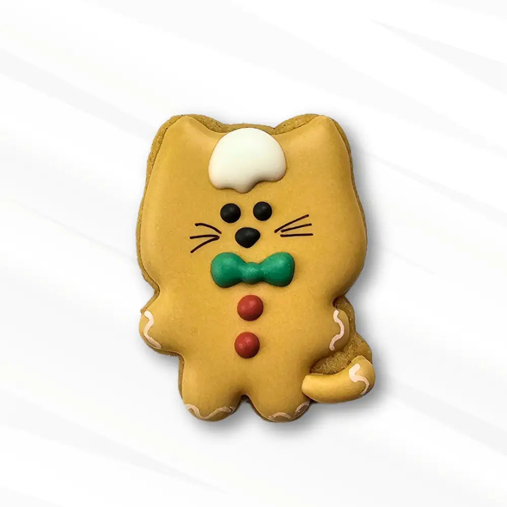 Gingerbread cat cookie with a bow tie royal icing transfer