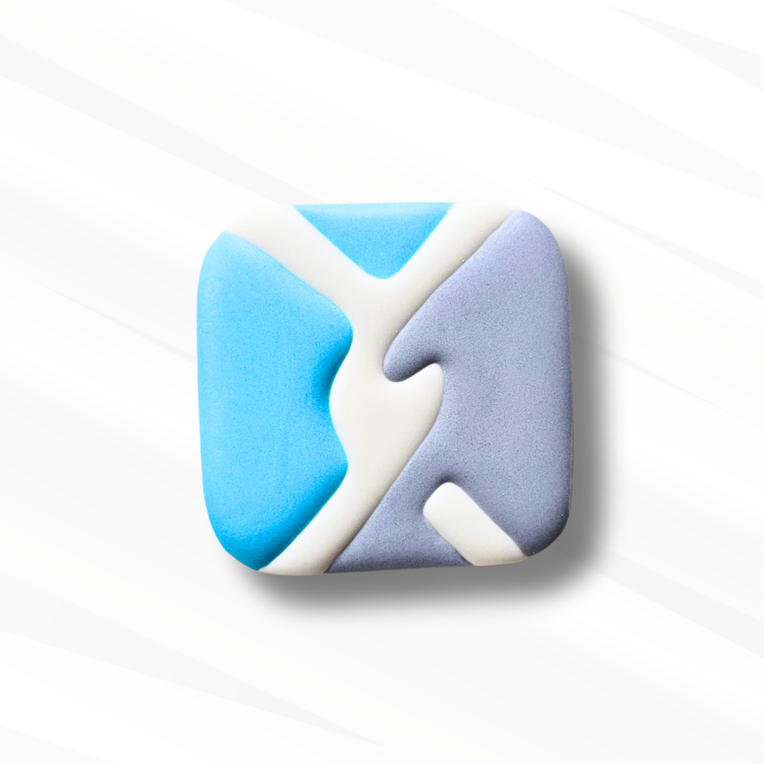 Decorated logo sugar cookie featuring a chain link design on a white background