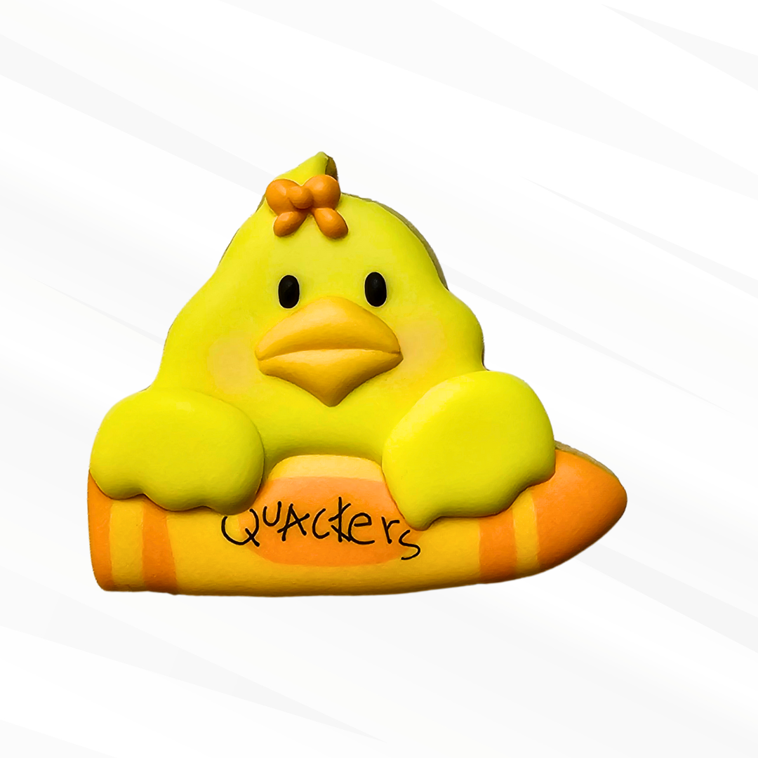 Sugar Cookie of a duck holding an orange crayon 